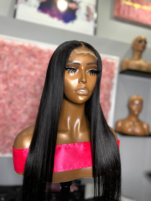 Jet Black Vietnamese Raw silky straight middle Part 22”